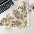 Floral cotton kerchief in beige with green and orange patterns and white lace trim - Twining Periwinkle