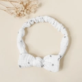 Detail of baby cotton gauze headband with star and moon prints and large bow design - Star & Moon Print