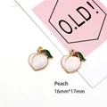 Close-up of pink peach fruit alloy charms with green leaves for DIY jewelry making - 8# Peach