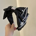 Elegant black satin headband featuring a large bow embellished with colorful rhinestones - Large Black