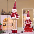 Christmas snowman plush with telescopic legs extending from 60cm up to 92cm height - Large Red Grid 90CM Telescopic Snowman