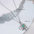 Collier tortue argenté avec nacre colorée et zircons sur un plateau de service - Argent / Tortue en Coquillage Bleu-Vert