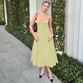 Elegant pale green backless midi sundress with cinched waist and flowing skirt - S / Yellow
