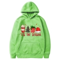 Grass green Christmas hoodie with 'TIS THE SEASON print and holiday motifs for couples - Fruit Green