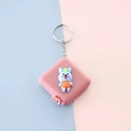 Pink square mini retractable tape measure keychain with a cute 3D blue cartoon bunny - Blue Rabbit