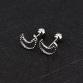 Macro shot of silver crescent moon cartilage studs with screw back ball closure detail - Hollow Moon and Star Necklace / Steel