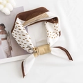 Brown and white houndstooth pattern faux silk neck scarf tied in a stylish knot - Abstract Houndstooth / Brown Edge