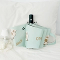 Ombrello pieghevole automatico capibara verde menta con protezione solare su letto - Automatico / verde chiaro
