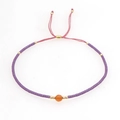 Bohemian adjustable beaded bracelet with purple seed beads and orange faceted bead - Purple