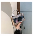Silver camera shaped mini bag with pink feathers and ribbon handle in metallic finish - Gold
