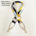 Detail of colorful woven bag strap with white leather ends and gold metal rotating hooks - Yellow Patchwork White Leather Gold Hook