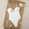 White one-piece swimsuit featuring a golden shell buckle and elegant thin straps - S / White