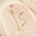 Detailed close-up of 18k gold plated extension chains with lobster clasps and heart charms - No.4 Gold Plated Peach Heart
