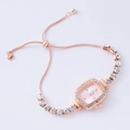 Close-up of rose gold square watch with crystal bracelet and pink dial on white background - Rose Gold-Square Pink Dial (Tadi)