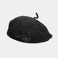 Close-up of black straw beret showing hand-woven texture and stylish crochet pattern - One Size / Black