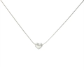 Detailed view of silver heart pendant with fine snake chain in matte metallic finish - Silver