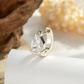 Golden drop zirconia hoop earring featuring a pear-shaped crystal on a white surface - Light Coffee Gold Teardrop Ear Clip (Single Piece) / Light Coffee-Gold