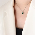 Silver-colored titanium necklace with a green heart zircon pendant on a fashion model - 40+5cm / Steel Color Green Zircon Necklace