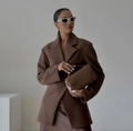 Detail of dark brown lapel blazer paired with high waist skirt and chic sunglasses - S / Coffee