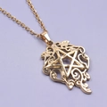 Pendentif étoile en acier 18K doré avec motifs de rinceaux sur chaîne en or - Collier / Or