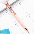Dried flower ballpoint pen with pink barrel and elegant rose gold metal accents - Pink
