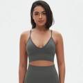 Detailed texture of seamless dark grey yoga sports bra with thin straps and V-neckline - S / Dark Gray