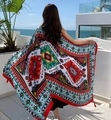 Macro shot of ethnic geometric print shawl with tassel details on a sunny beach - Red Green Black Yellow Geometric (Ethnic Geometric-2)