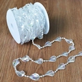Iridescent teardrop bead chain with AB rainbow coating on a white plastic spool - 10m / Iridescent Feather Beads