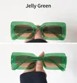 Detail view of jelly green rectangular sunglasses with wide temples and brown lenses - Jelly Green