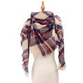 Women's multi-color plaid triangle scarf with tassel trim on a mannequin bust - Beige Multi-color Plaid