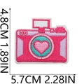 Pink camera embroidery patch with heart detail showing 4.8cm by 5.7cm size measurements - No.26-Camera