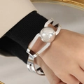 Minimalist silver geometric cutout bangle with a polished metal sphere for women - Z084-Steel Silver Bangle