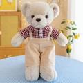 Beige teddy bear plush toy wearing a red plaid shirt and khaki suspender shorts - Red Couple Bear Male