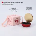 Spherical dark red magnetic jewelry box with pink outer gift packaging and bow - Spherical Rose Flower Box / Red