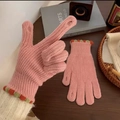 Pink knitted fingerless touchscreen gloves with small colorful dots on the wrist - Deep Pink