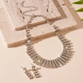 Macro detail of luxury rhinestone fringe necklace and earring set on textured stone - Silver 2-Piece Set Square Stud Earrings Necklace
