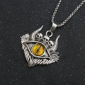 Detail of gothic devil eye necklace with yellow gemstone and skull pendant - Yellow Eye with Three Skulls