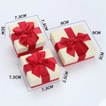 Three red and white jewelry gift boxes with ribbon bows and size dimensions shown - 7*7*5cm / Red and Beige