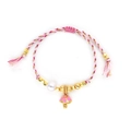 Detailed close-up of woven pink and white cotton cord bracelet with gold mushroom charm - Pink Mushroom/Pink White Mixed Cord