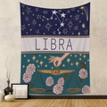 Close-up of Libra zodiac wall tapestry with constellations and bohemian floral details - Libra