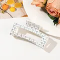 Holographic skull print white rectangular hair claw clip with metallic spring hinge - Cream White Iridescent Skull