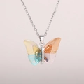 Close-up of a dreamy acrylic butterfly pendant with gold foil and colorful gradients - Silver Chain-Colorful Gradient
