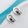 Détails de boucles d'oreilles doubles anneaux argentés avec chiffres romains et zircon - Boucles d'oreilles clous / Acier