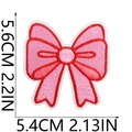 Detailed view of pink embroidered bow patch with red edges and size dimensions in inches - US 10