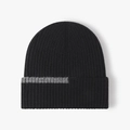 Black ribbed knit beanie with grey horizontal stripe on the cuff for winter warmth - Black