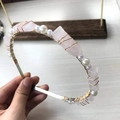 Detailed close-up of handmade pink quartz and white pearl beads on a silver crown headband - Rose Quartz Gold Wire Silver Headband