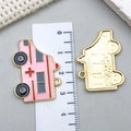 Pink ambulance charm for DIY jewelry with ruler showing 3cm length measurement - Pink Ambulance