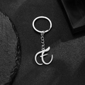 Artistic silver stainless steel letter E pendant keychain with polished finish - Letter E