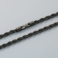 Collana in acciaio al titanio nero con maglia a torsione e chiusura a levetta rotante - Bracciale Intrecciato Nero (22,5 cm)