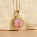 14K gold plated necklace featuring an oval pink zircon stone with a clear crystal halo - Pink